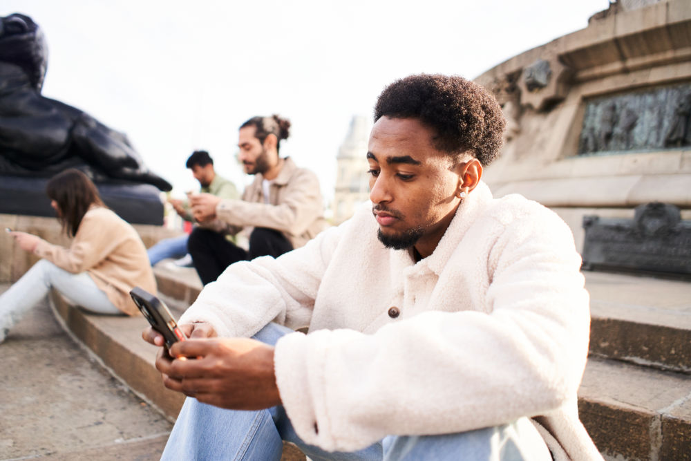 Man with ADHD distracted by phone