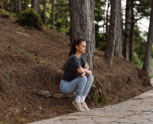Young woman considering betrayal trauma