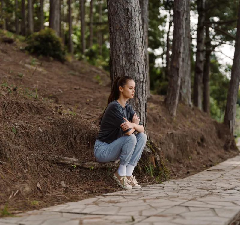 Young woman considering betrayal trauma