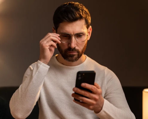 Man with ADHD looking phone