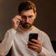 Man with ADHD looking phone