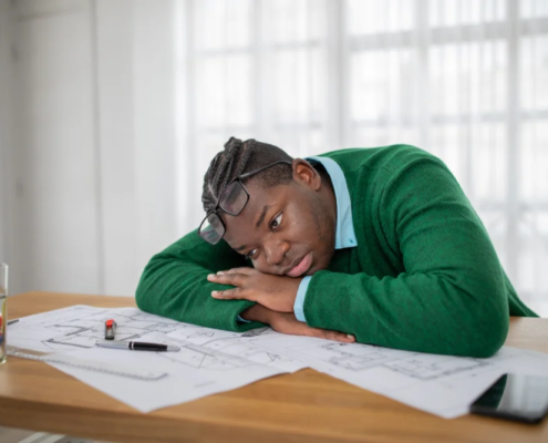 Man trying to overcome procrastination