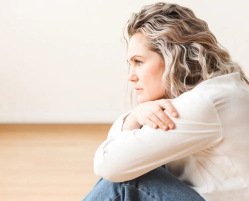 thoughtful woman feeling shame